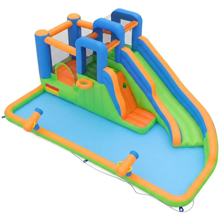 Inflatable water slide with dual climbing walls, splash pool, and basketball hoop for year-round outdoor fun.