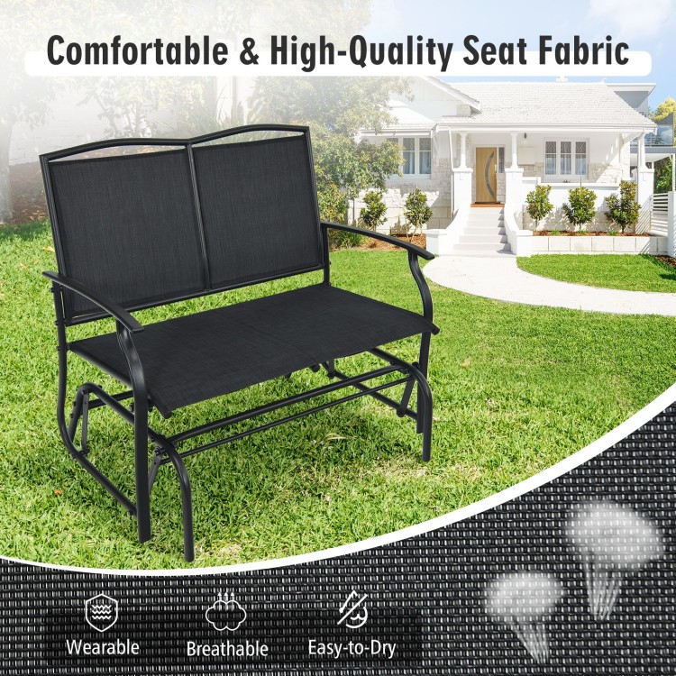 Black iron patio rocking chair for two, featuring a durable metal frame and comfortable seating for outdoor relaxation.