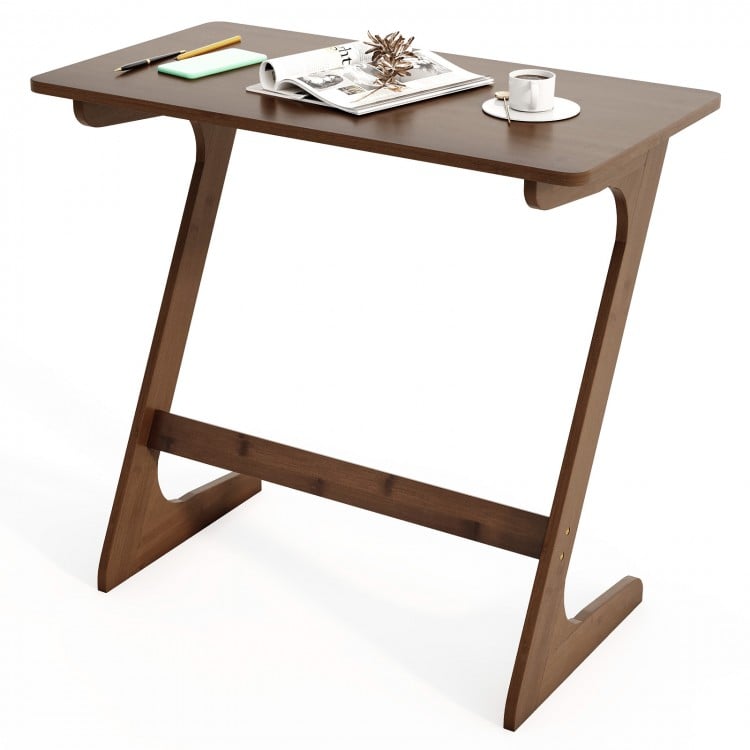 Z-shaped brown bamboo side table with spacious tabletop, ideal for snacks or laptops, perfect for small spaces.