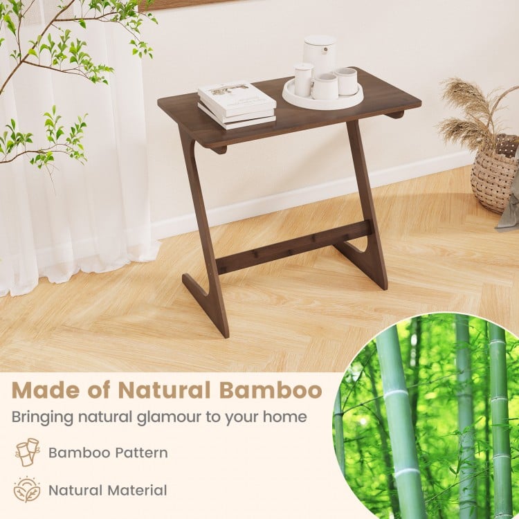 Z-shaped brown bamboo side table with spacious tabletop, ideal for small rooms and multi-functional use.