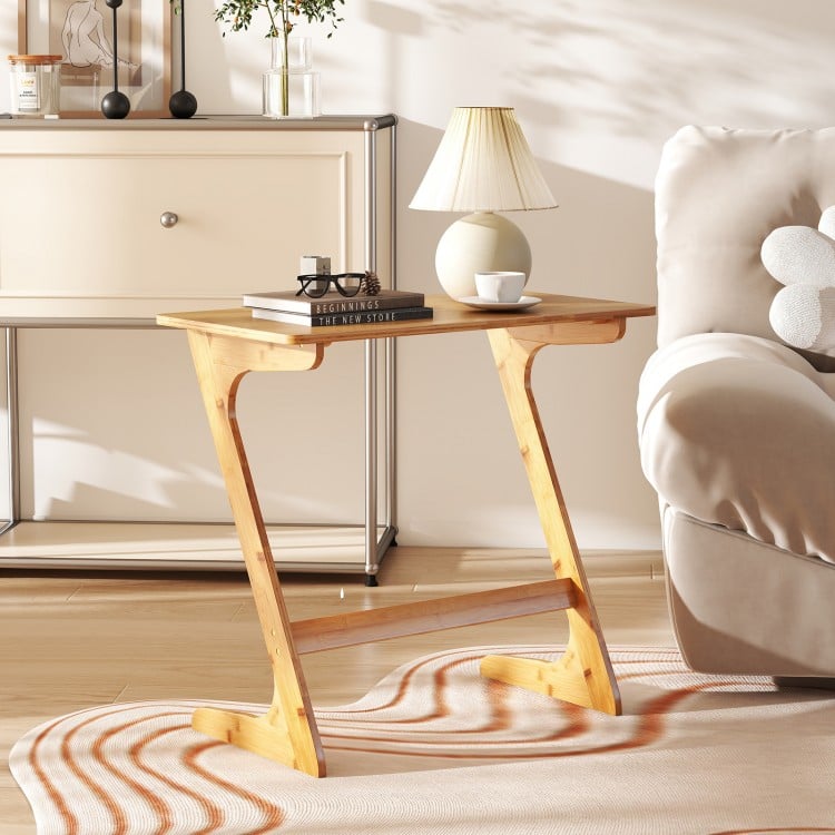 Bamboo Z-shaped side table with unique design and rounded corners, perfect for a stylish addition to any living space.