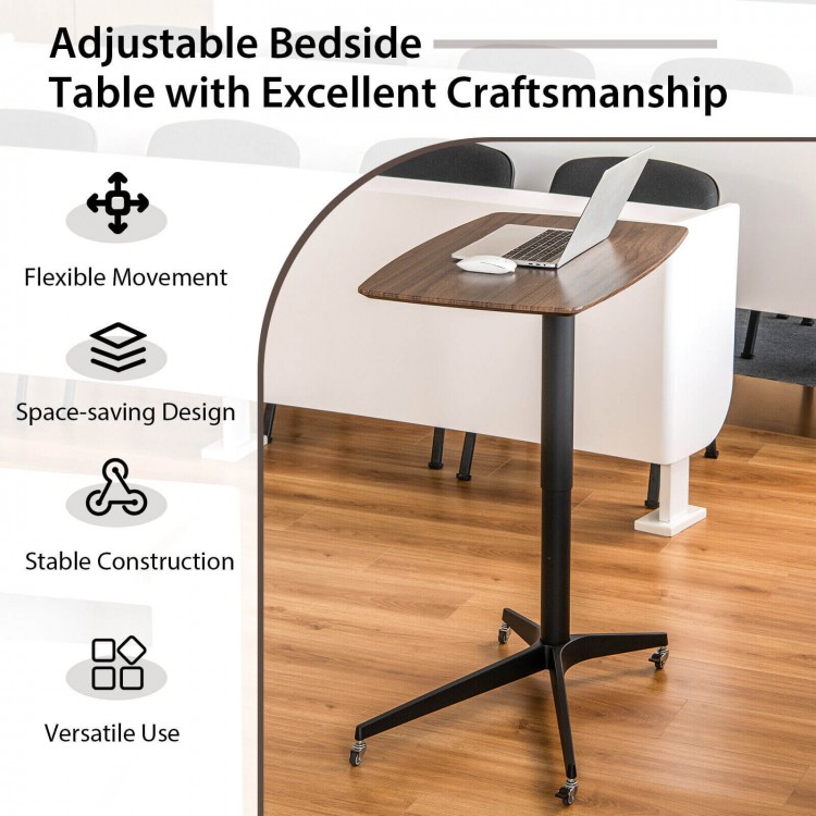Height adjustable mobile standing desk in brown with lockable wheels, ideal for versatile use in living rooms or.