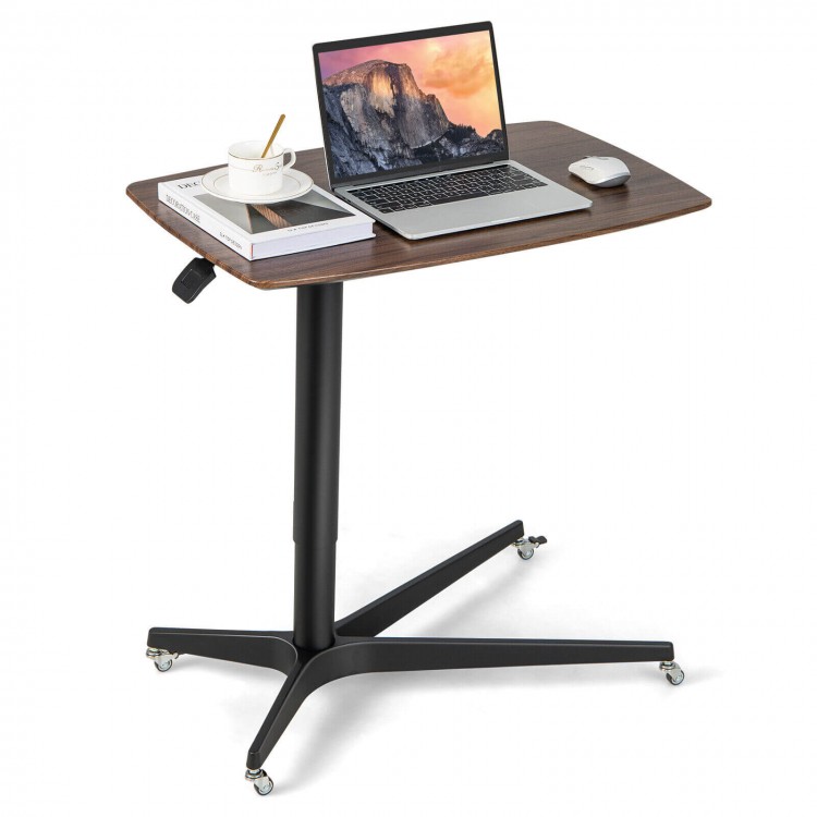 Height adjustable mobile standing desk in brown with lockable wheels, ideal for versatile use in various settings.