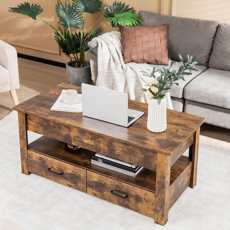Lift top coffee table in rustic brown with two storage drawers, ideal for working or dining in a stylish living room.