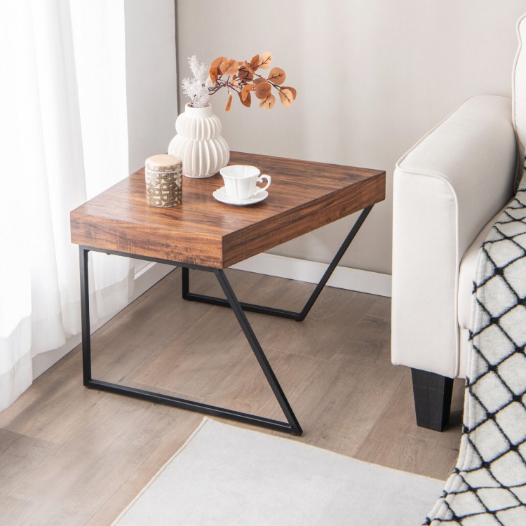 Trapezoid-shaped coffee table with a spacious wooden top and black powder-coated metal legs, perfect for modern living.