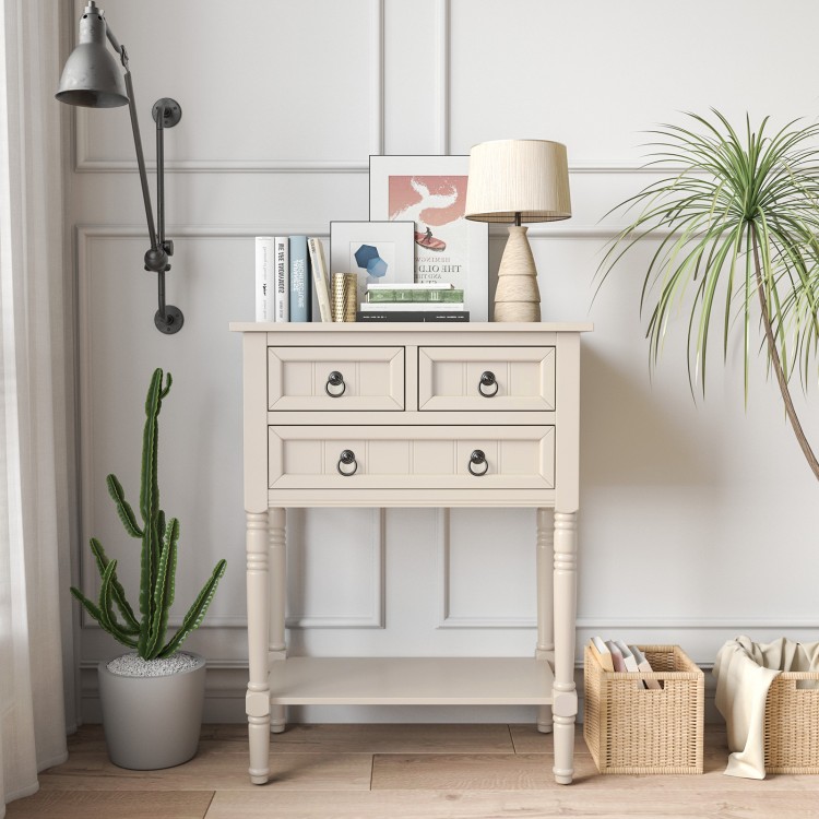 Narrow beige console table with three storage drawers and open bottom shelf, perfect for entryways or small spaces.
