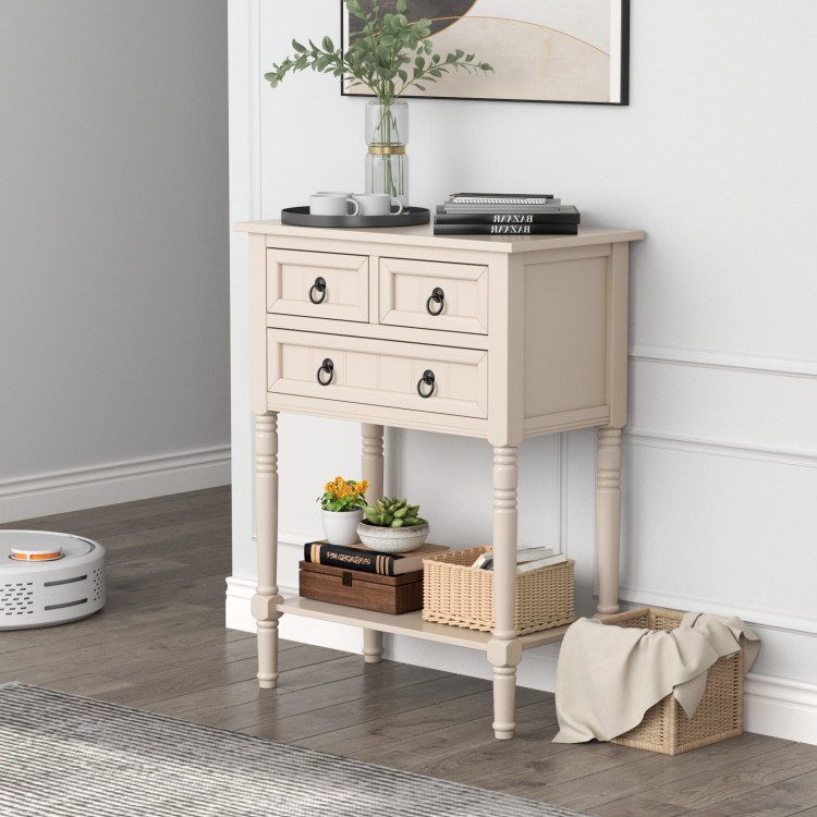 Beige narrow console table featuring a smooth surface, three drawers, and an open bottom shelf for stylish storage.
