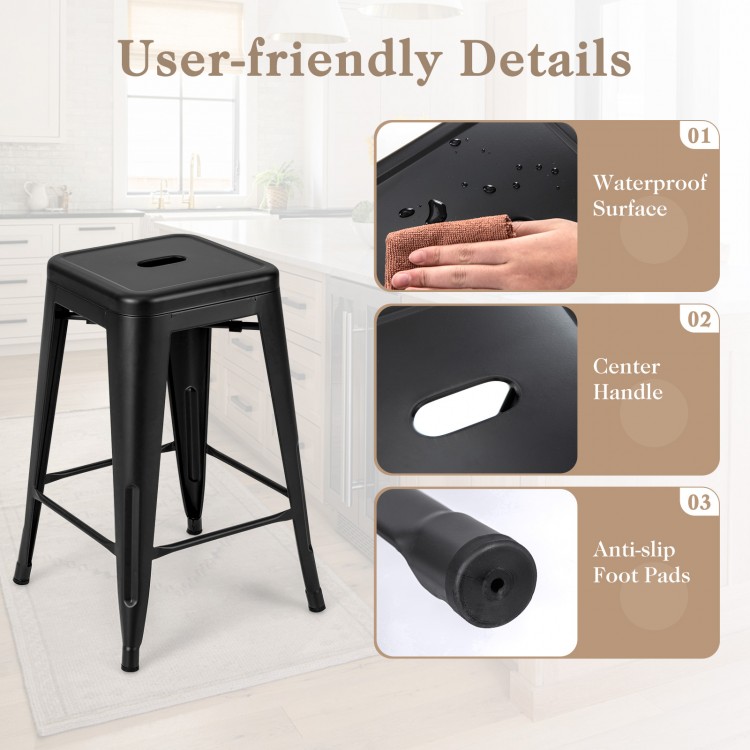 Black 24-inch Tolix style barstool with waterproof surface, center handle, and anti-slip foot pads for kitchen use.