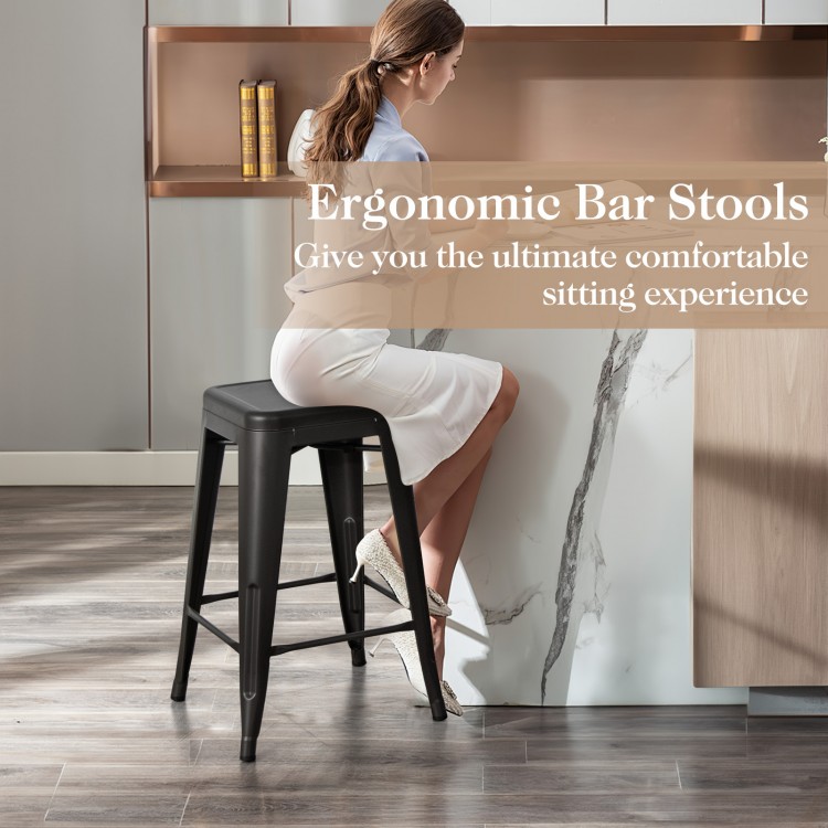 Black 24-inch Tolix style bar stool with backless design, stackable feature, and waterproof surface for kitchen use.