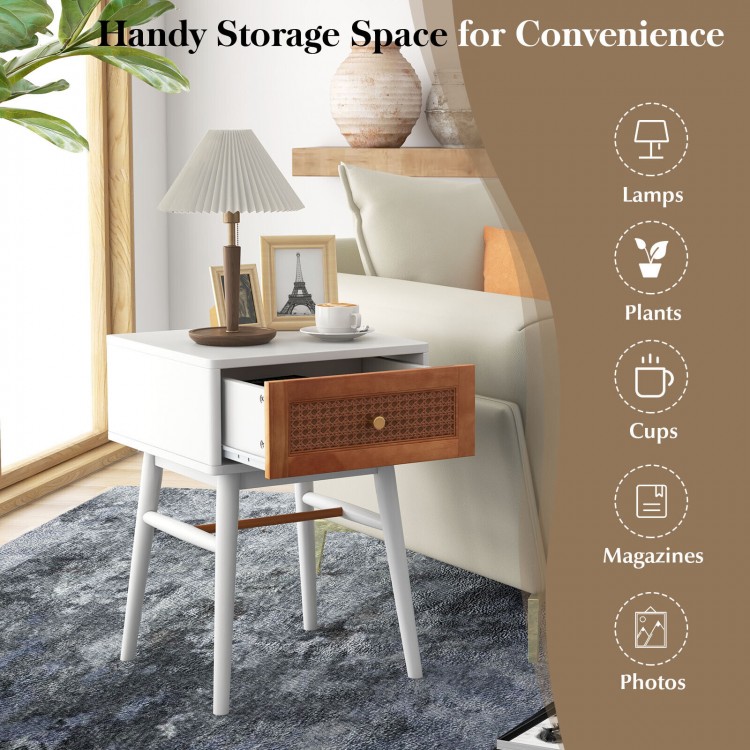 Modern bedside table with solid wood legs and rattan drawer front, ideal for lamps and plants in any room.