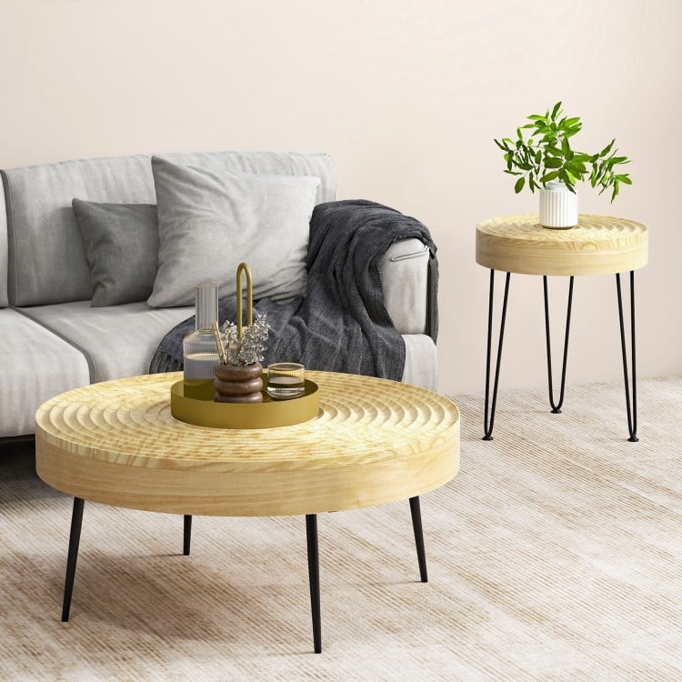 Natural solid wood round coffee tables with ripple pattern, sturdy metal legs, perfect for living room or bedroom use.
