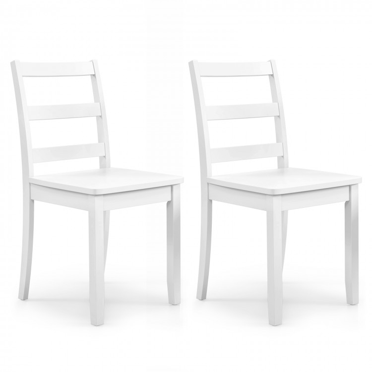 Set of 2 white wood dining chairs with solid rubber wood legs, featuring a ladder back and large seat for comfort.