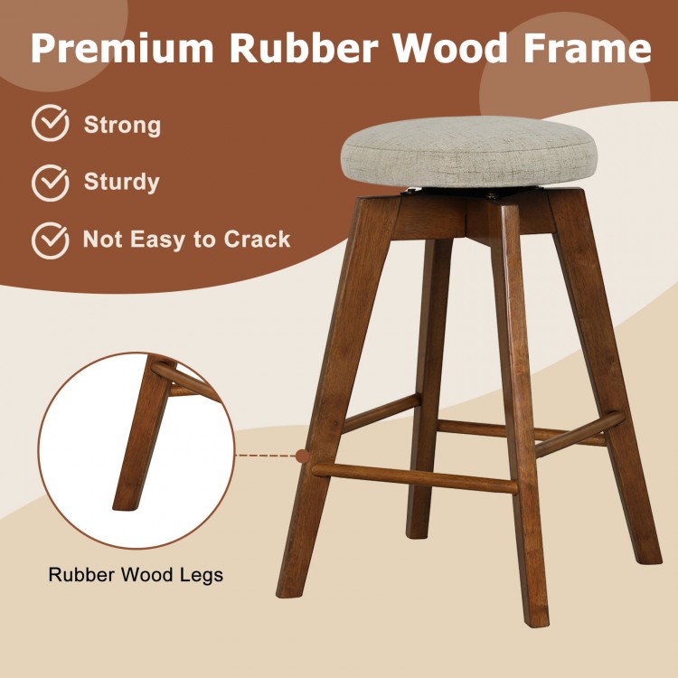 Backless swivel barstool with beige linen fabric seat and rubber wood legs, perfect for counter height use.