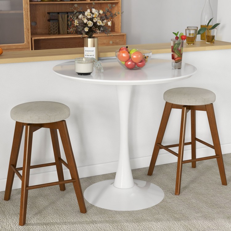 Backless swivel barstools with beige linen fabric seats and rubber wood legs, perfect for counter height use.