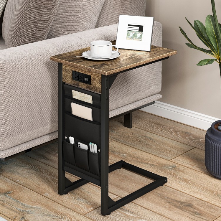 C-shaped end table in rustic brown with charging station and side storage bag, perfect for living room or bedroom use.