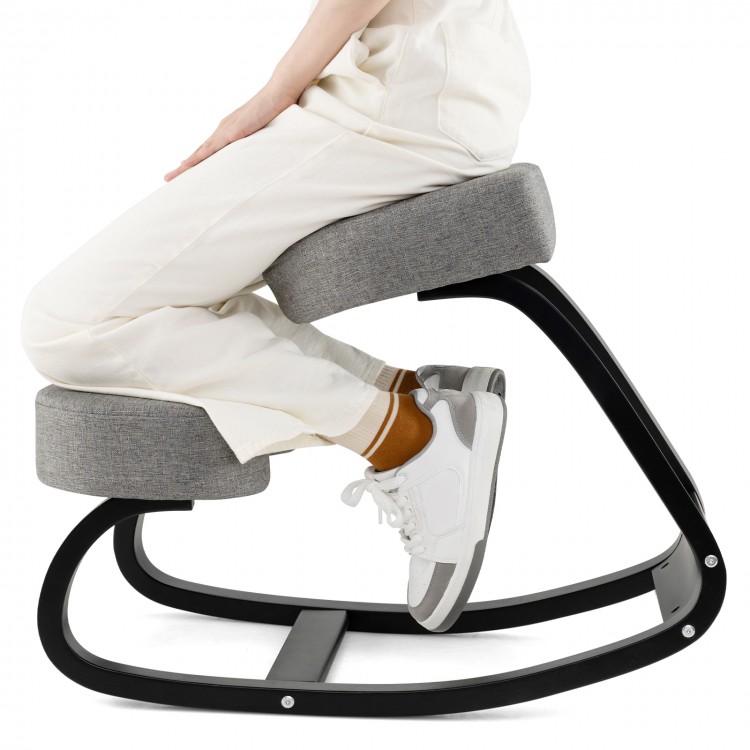 Ergonomic rocking kneeling chair in grey with padded cushion, promoting active sitting for enhanced productivity.