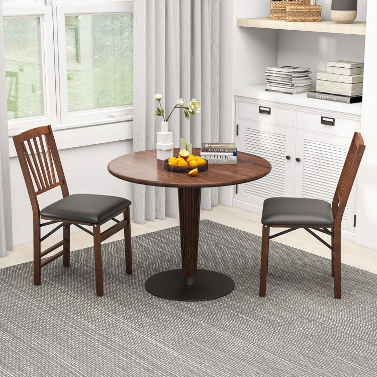 Set of 2 folding chairs with padded seats and rubber wood frames in brown, perfect for dining or casual seating.