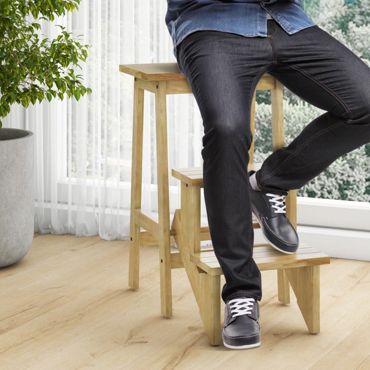 3-in-1 rubber wood step stool with anti-slip surface, used as a stool or ladder, featuring a convenient handle.