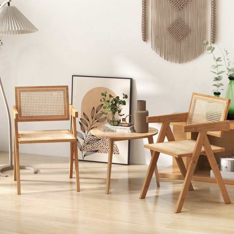 Set of 2 natural bamboo accent chairs with cozy backrest and armrest, perfect for living room or dining area.