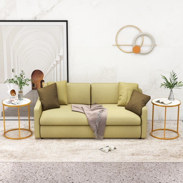 Compact round side table with a high-quality faux marble top and golden metal frame, ideal for modern living room decor.