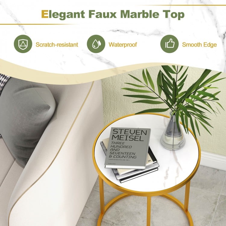 Close-up of the elegant faux marble tabletop with a smooth edge, supported by a durable golden metal frame.