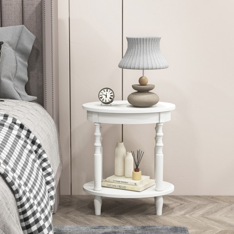 2-tier oval side table in white with storage shelf and solid rubber wood legs, perfect for bedroom or living room use.