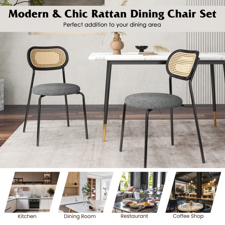 Single gray rattan dining chair with ergonomic backrest and padded seat, ideal for stylish dining spaces.
