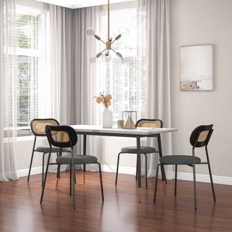 Set of 2 gray rattan dining chairs with metal legs, featuring ergonomic backrest and padded seats for comfort.