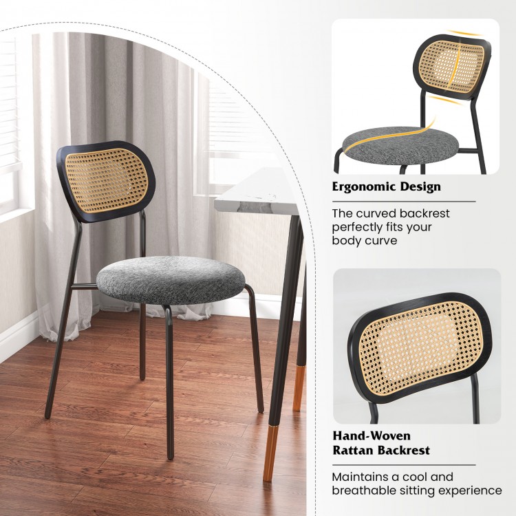 Rattan dining chair with ergonomic design, padded seat, and metal legs, perfect for modern dining areas.