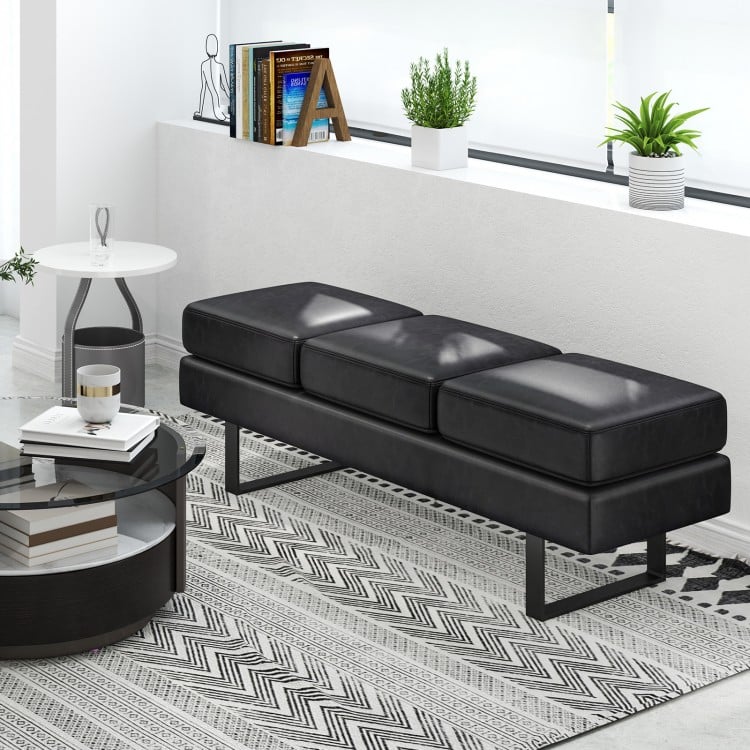 Black waiting room bench seating with removable cushions and metal frame, ideal for reception areas and comfortable.