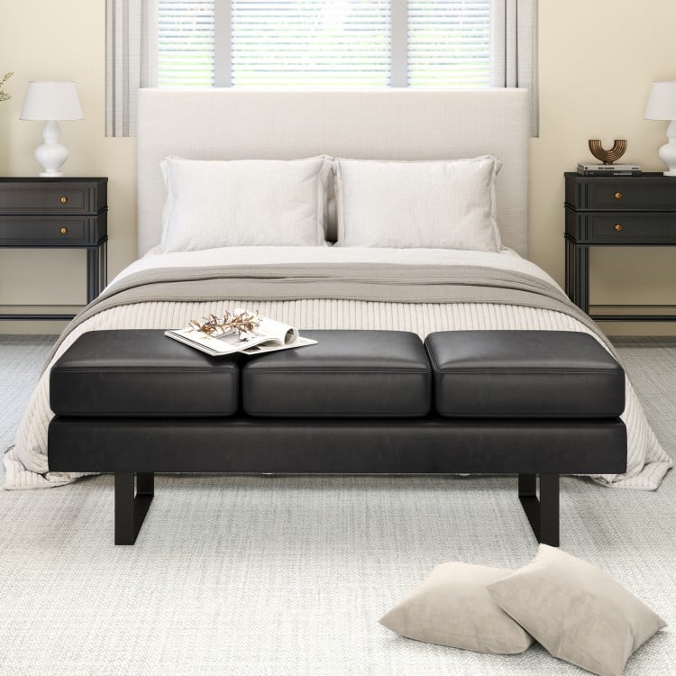 Black waiting room bench with removable cushions and metal frame, designed for comfort and stability in reception areas.