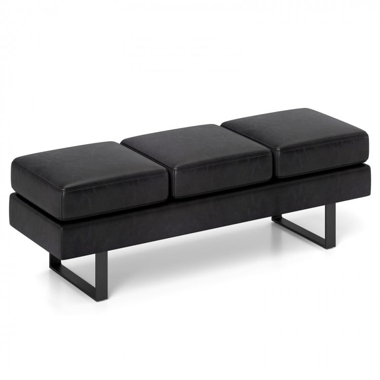 Long black waiting room bench with removable cushions and metal frame, designed for comfort and stability.