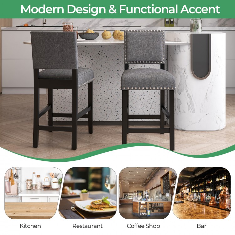 Set of 2 counter height chairs with solid rubber wood frame, cushioned seat, and decorative rivets for kitchen or bar.