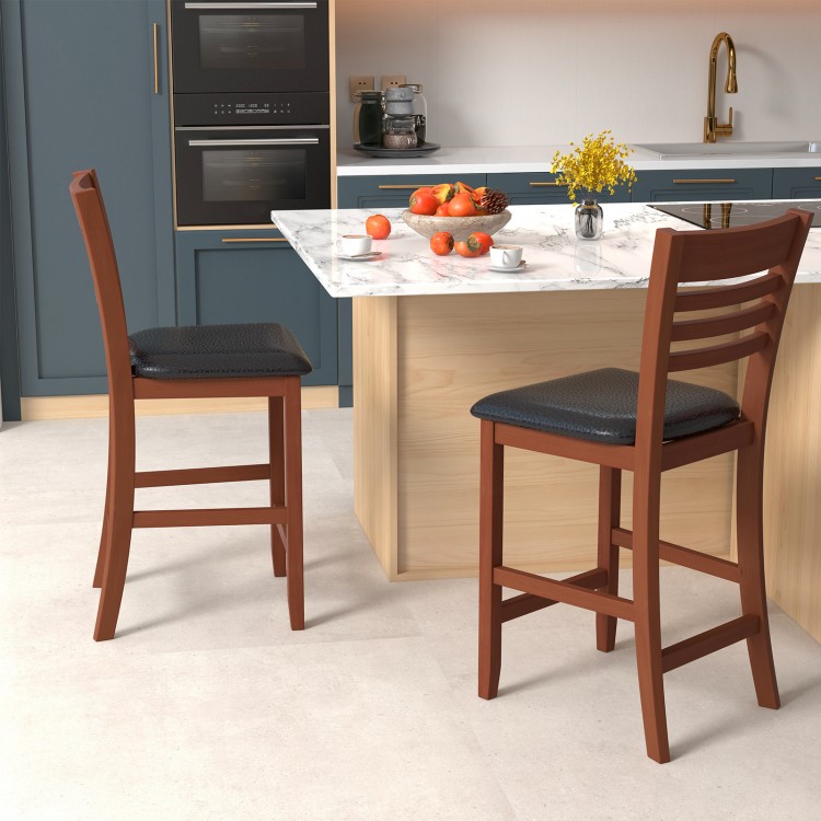 Counter height bar chairs in walnut with padded seats and backrests, ideal for kitchen islands or dining areas.