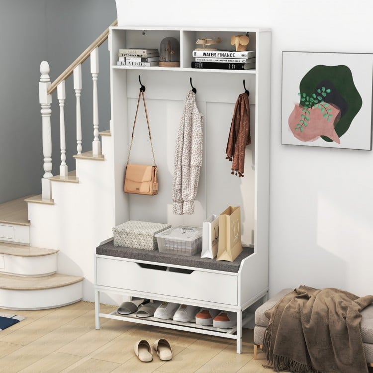 Tall white hall tree with coat rack, shoe storage, and cushioned bench, ideal for entryway organization.