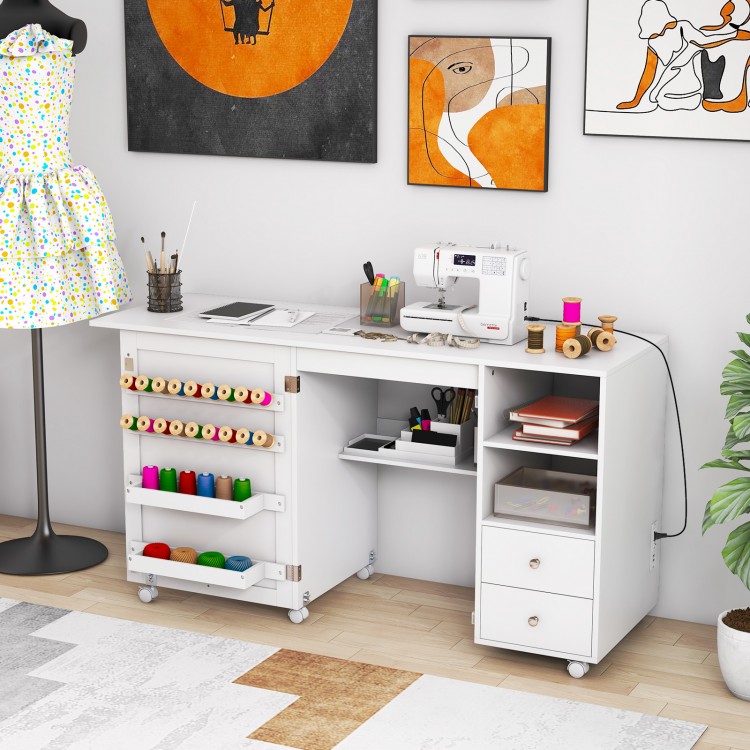Folding sewing table in white with 2 cube storage shelves, 1 open shelf, and spacious design for versatile crafting.