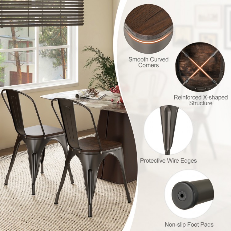 Set of 4 Tolix style metal dining chairs with wood seats, featuring ergonomic design and stackable convenience for.