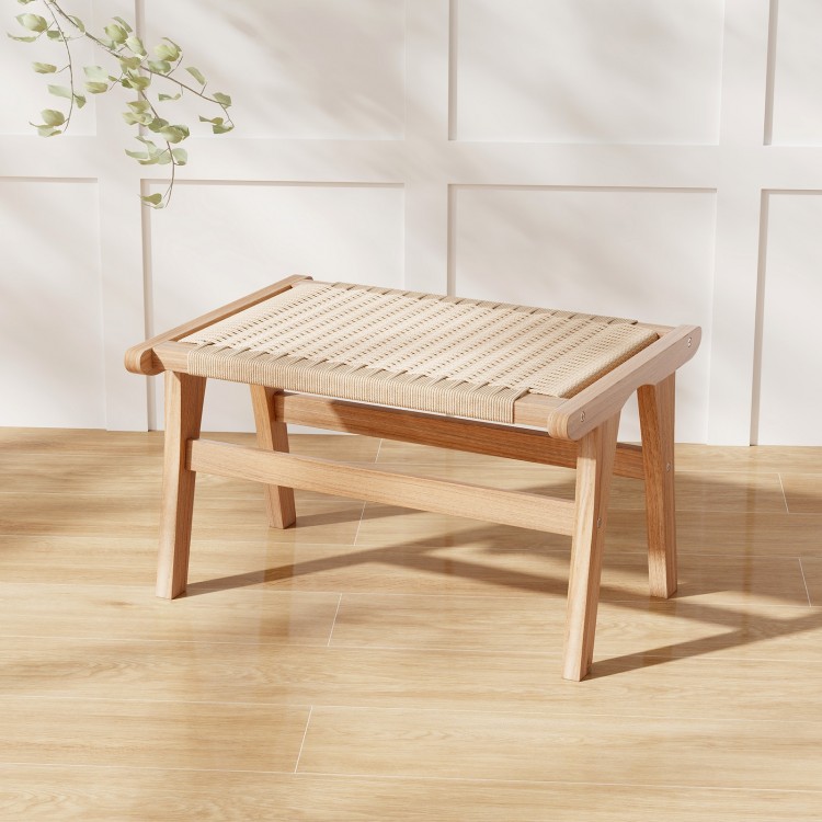 Teak wood ottoman footstool with braided rope surface, featuring smooth edges and sturdy construction for indoor use.