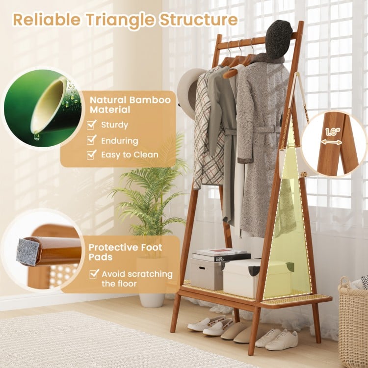 Bamboo clothes rack with hanging rod, rattan shelf, and copper hooks, perfect for organizing coats and accessories.