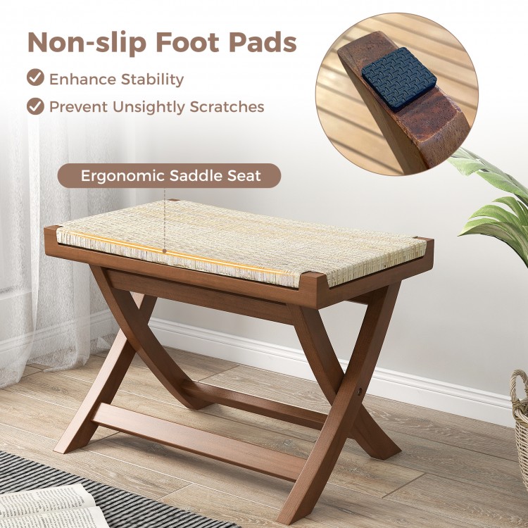 Folding natural rattan ottoman with hand-woven seat, ergonomic design, and non-slip foot pads for stability.