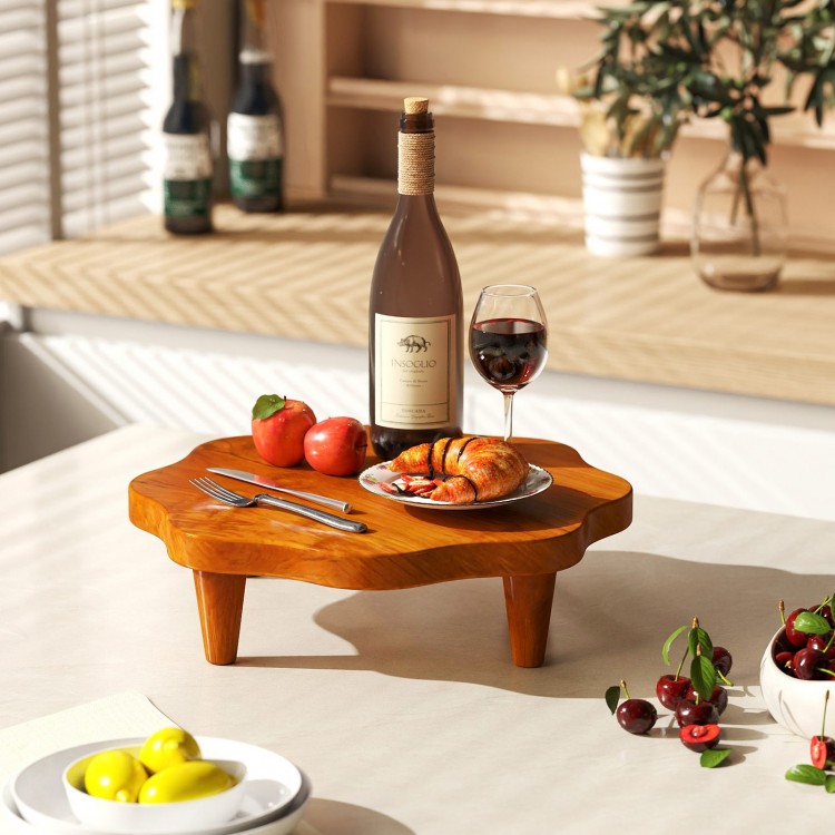 Teak wood pedestal stand with flower-shaped top, ideal for displaying snacks and decor in kitchen or patio settings.