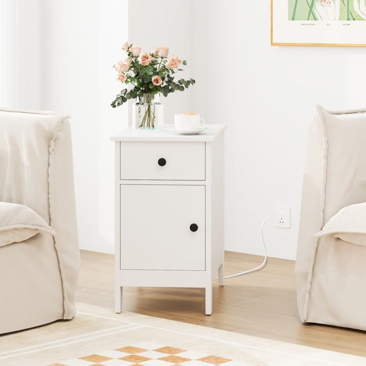 White flip top end table with charging station, drawer, and magazine holder for bedside or sofa side use.