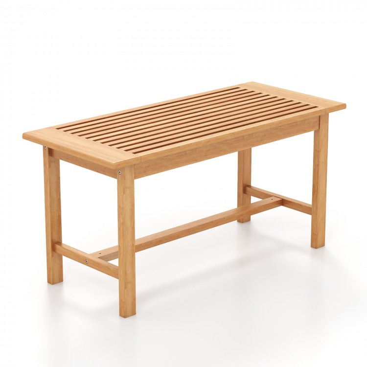 Rectangular 36-inch patio coffee table made of teak wood with a slatted tabletop, ideal for outdoor use by the poolside.