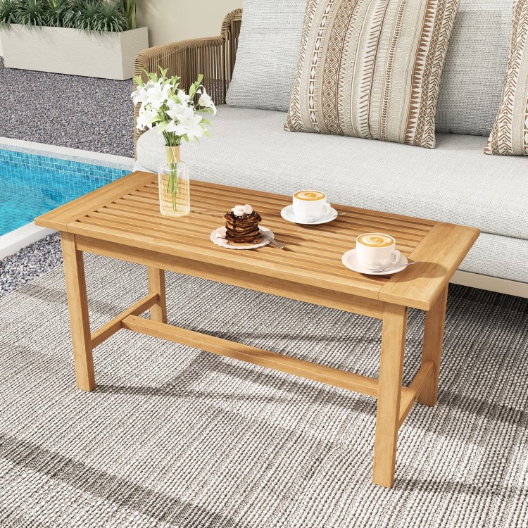 Rectangular 36-inch patio coffee table made of teak wood, featuring a slatted tabletop, ideal for outdoor use by the.
