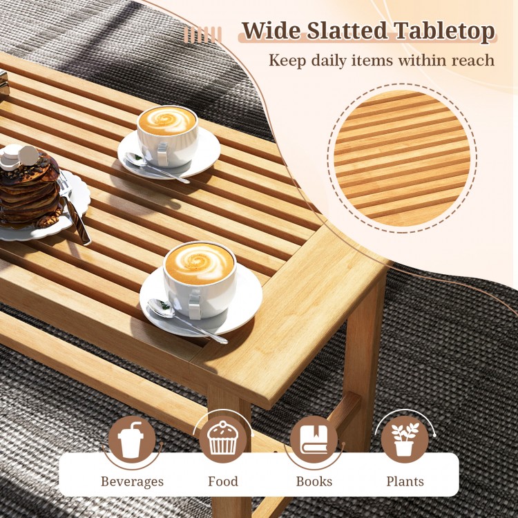 Rectangular patio coffee table with a wide slatted teak wood tabletop, ideal for outdoor beverages and plants.