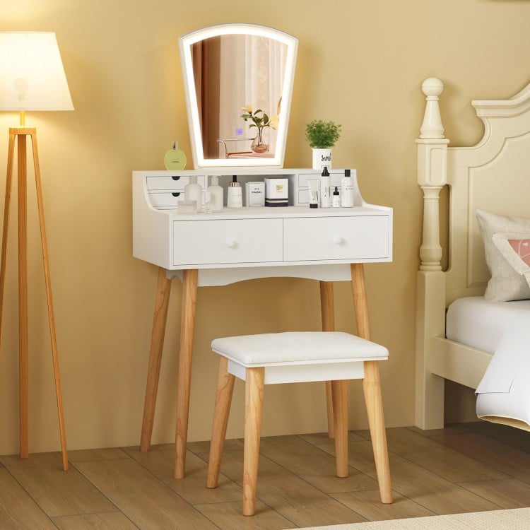White vanity desk set with adjustable LED mirror, six drawers, and a padded stool, perfect for makeup and decor.