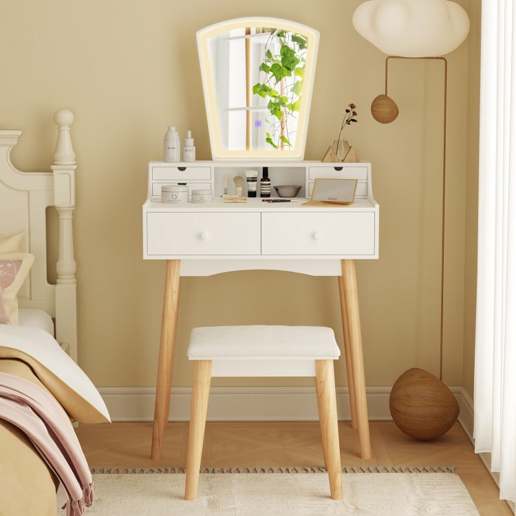 Vanity desk set in white with adjustable LED mirror, six drawers, and a padded stool for stylish makeup organization.