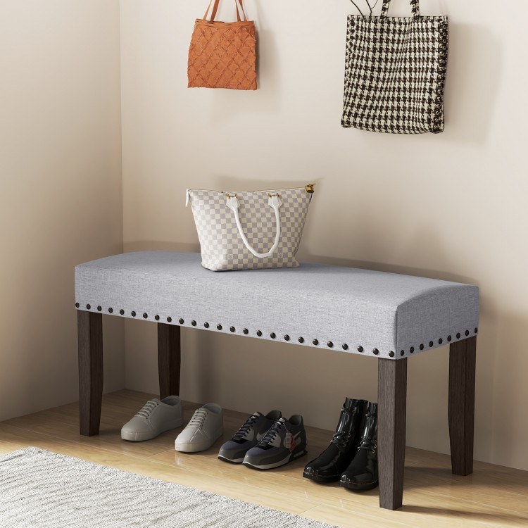 Gray upholstered entryway bench with nailhead trim, 42.5" long, sturdy rubber wood legs, ideal for shoe storage.