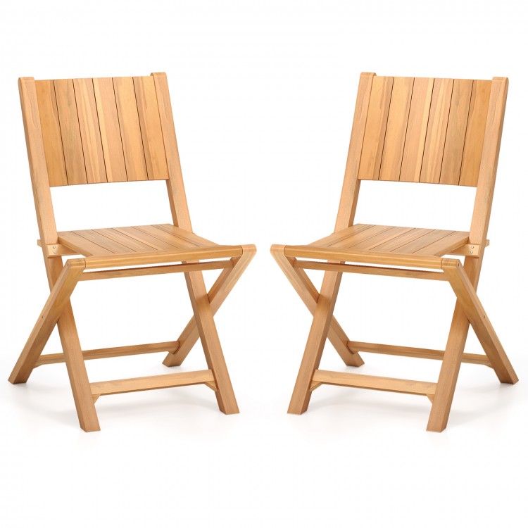 Two teak wood outdoor dining chairs with slatted design, ergonomic support, and folding feature for easy storage.