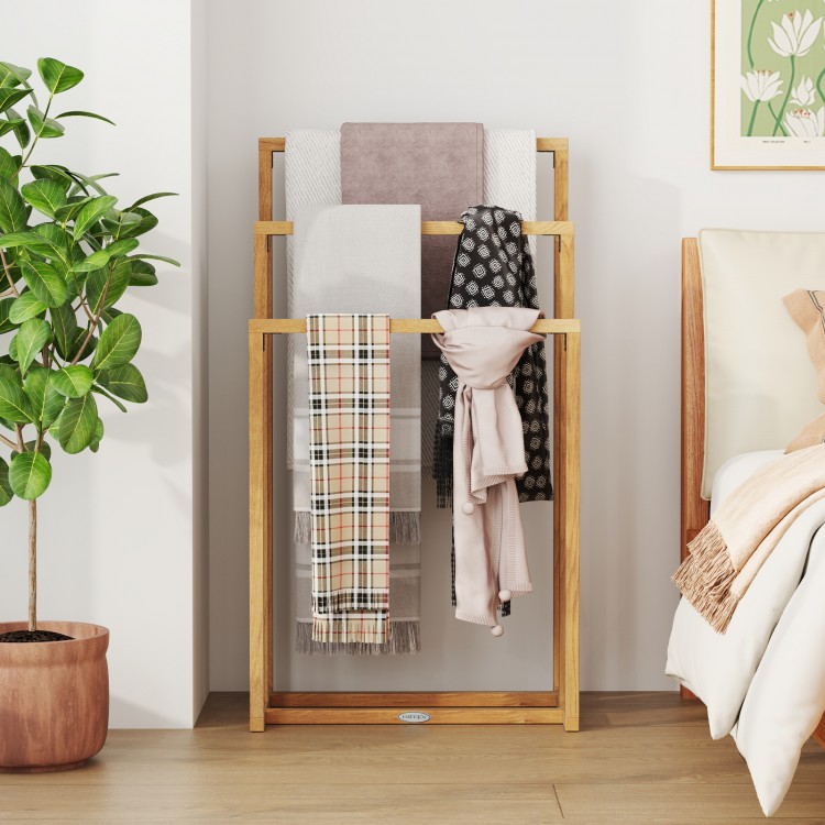 3-tier teak wood towel rack showcasing three hanging crossbars, perfect for organizing towels in bedrooms or living.